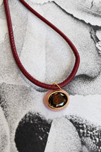 ALV Jewels EE Oval Cord Necklace — Pink, Burgundy cord, oval pendant, pink surround, faceted deep red center, gold-tone trim