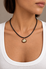 ALV Jewels EE Oval Cord Necklace — Brown, Dark cord, oval pendant, faceted champagne-tone center, brown surround, gold-tone accents