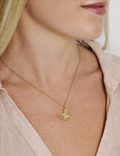 Anabel Aram Butterfly Gold Necklace, model wearing small pendant