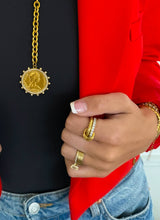 The Grace Ring in gold with pavé crystal detail styled on hand with watch and bracelets