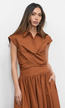 Rust-colored wrap blouse with modern tailored fit