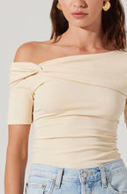 Twisted shoulder and fold-over detail on the Saylah Off Shoulder Top in cream