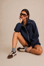 navy track jacket with white piping