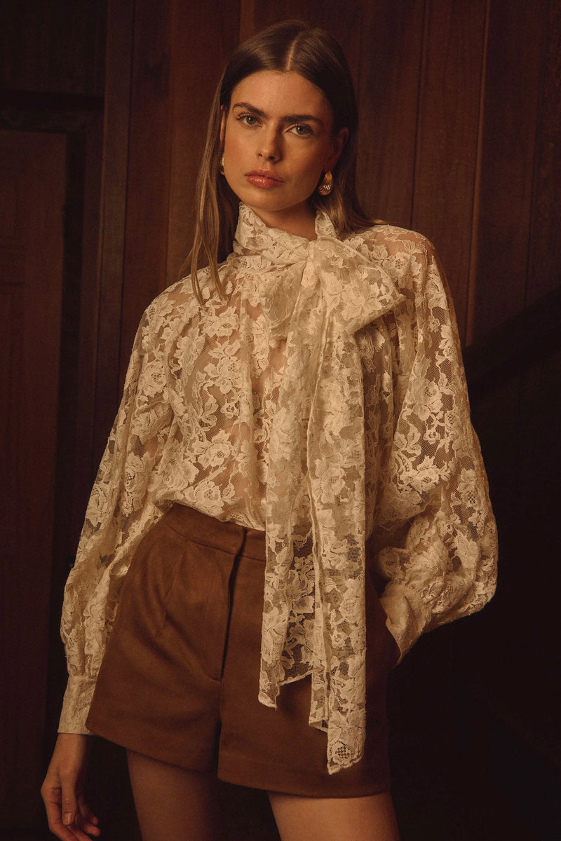 Sheer lace blouse with balloon sleeves and bow tie neckline by ASTR