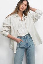 Striped two-in-one button-down top with layered effect