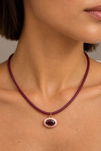 ALV Jewels EE Oval Cord Necklace — Pink, Burgundy cord, oval pendant, pink surround, faceted deep red center, gold-tone trim