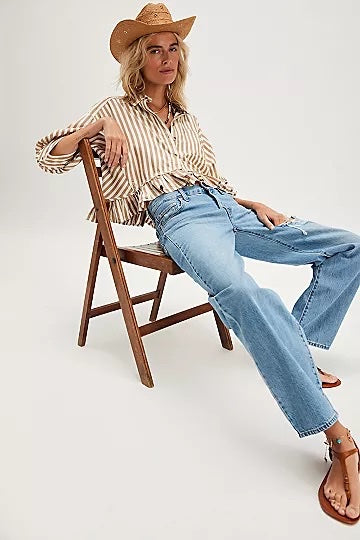 Free People Bailey Shirt featuring wide vertical stripes and raw hem details