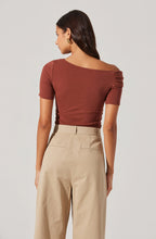 Asymmetrical neckline and fitted design on the Saylah Top by ASTR the Label