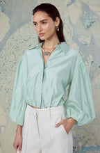 Front view of Cordey balloon sleeve top by ASTR The Label with button front closure