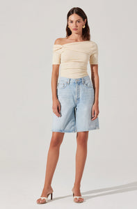 Fitted silhouette of the Saylah Twist Top by ASTR the Label paired with neutral heels
