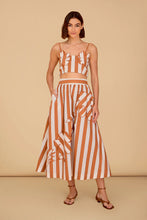 Kit Skirt - Styled view showing functional pockets and midi length