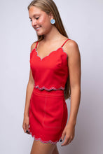 red top and skirt set