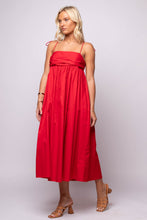  red cotton poplin dress, with sweetheart neckline and full midi skirt.