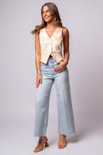 floral vest with light wash denim
