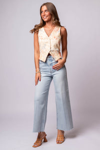 floral vest with light wash denim