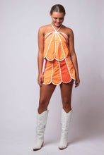 orange top and skirt set color block
