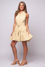 Lowen Mini Dress by En Saison in light yellow with a belted waist, ruffle pockets, and button-down front.