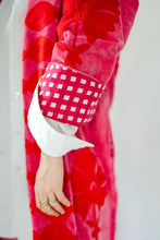 Sgt. Pepper Captain Cherry Bomb duster showing checked cuff lining
