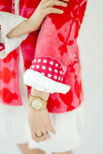 Sgt. Pepper Crew Cherry Bomb jacket with red-and-white checked cuff, detail view