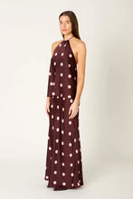 NIA Cressida halter top with Natalia polka dot skirt, angled model view