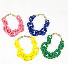 Color options of the Michelle Necklace including yellow, emerald green, royal blue, and pink