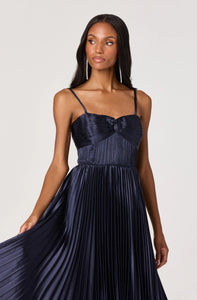 Navy pleated dress with sweetheart neckline and smocked back panel
