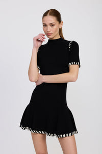 Model wearing the Romilla Stitch Mini Dress