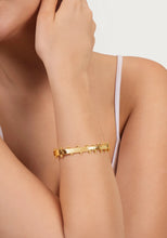 Milos Hinged Bangle Gold styled on wrist – everyday gold statement jewelry