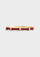 Side view of Anabel Aram Bamboo Hinged Bangle – enamel and gold finish