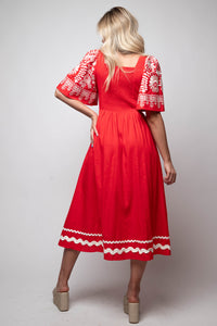 midi dress with v neck and embroidered sleeves