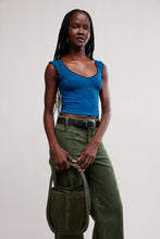 Free People Barlow bucket bag held by model, full outfit view