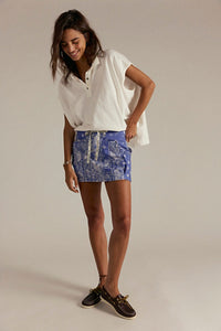 Bold paisley mini skirt with drawstring waistband and oversized pockets