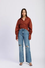 Minimal wrap front shirt with tailored yet relaxed silhouette