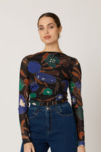 Model wearing the Remy Top from Cleaobella