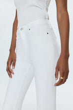 Lennon High Rise Boot Jean - Close-up of comfort-stretch denim fabric