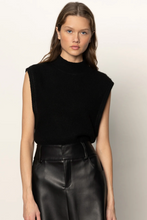 Model wearing City Sweater Shell by Sanctuary in black with mock neck and ribbed hem
