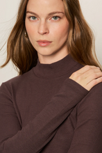 Model wearing the LS Mock Essential top by Sanctuary in long sleeve fitted silhouette with mock neck