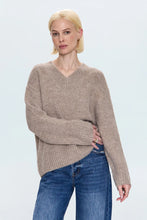 Model is wearing the Talia Sweater in Taupe