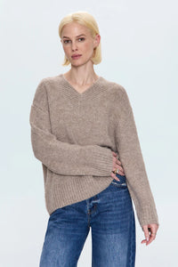 Model is wearing the Talia Sweater in Taupe