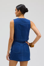 ALLISON New York Andie Vest in Navy, back view styled with a navy skirt