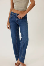 Classic denim with raw hems and lived-in texture from Free People