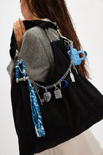 Free People black tote bag with silver hardware and soft shape