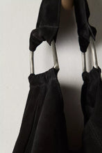 Industrial-inspired tote with silver hardware detail