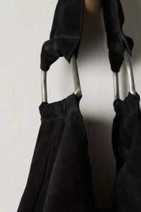 Industrial-inspired tote with silver hardware detail