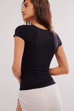 Clean Lines Baby Tee by Free People in a fitted black silhouette with short sleeves