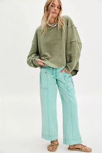 green Free People ribbed knit tee with a relaxed fit and worn-in feel