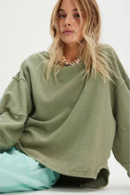 we the free Muted long sleeve pullover styled for effortless everyday wear