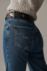 Free People mid rise jeans with straight leg silhouette and subtle fading