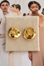 Easton Elle gold dipped pearl stud earrings on a cream earring card.