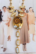 Easton Elle Fossil Necklace Long detail, enhanced product photograph on fashion magazine